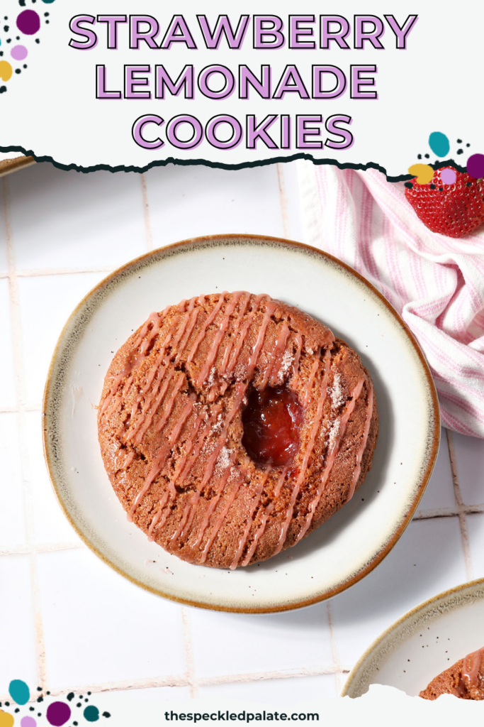 Two Strawberry Lemon Cookies on plates on a tiled white surface with a pink and white striped linen and fresh strawberries with the text strawberry lemonade cookies