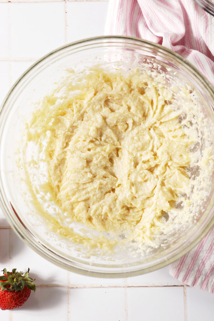 Mixed wet ingredients for Strawberry Lemonade Cookies in a bowl