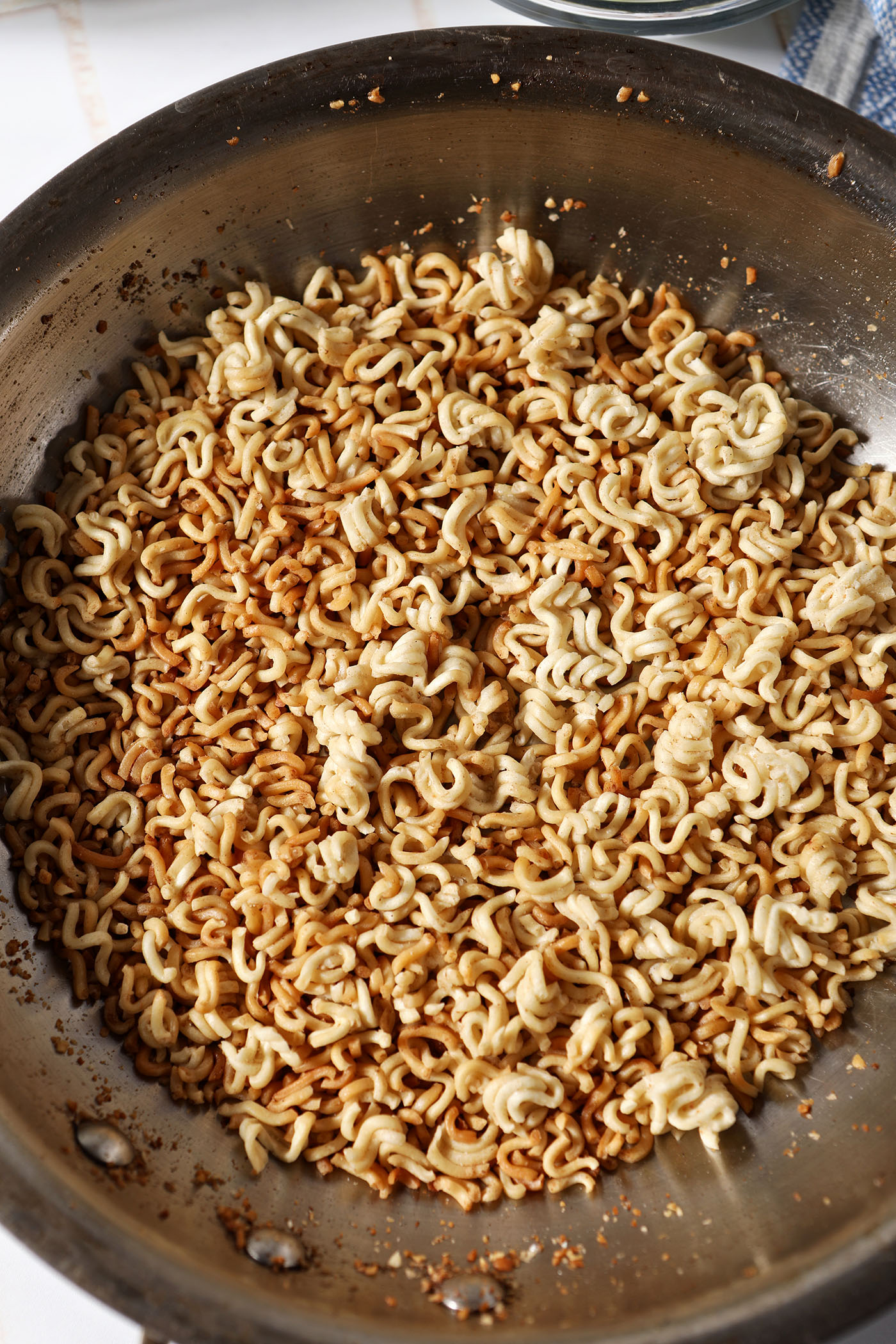 Toasted ramen noodles in a skillet