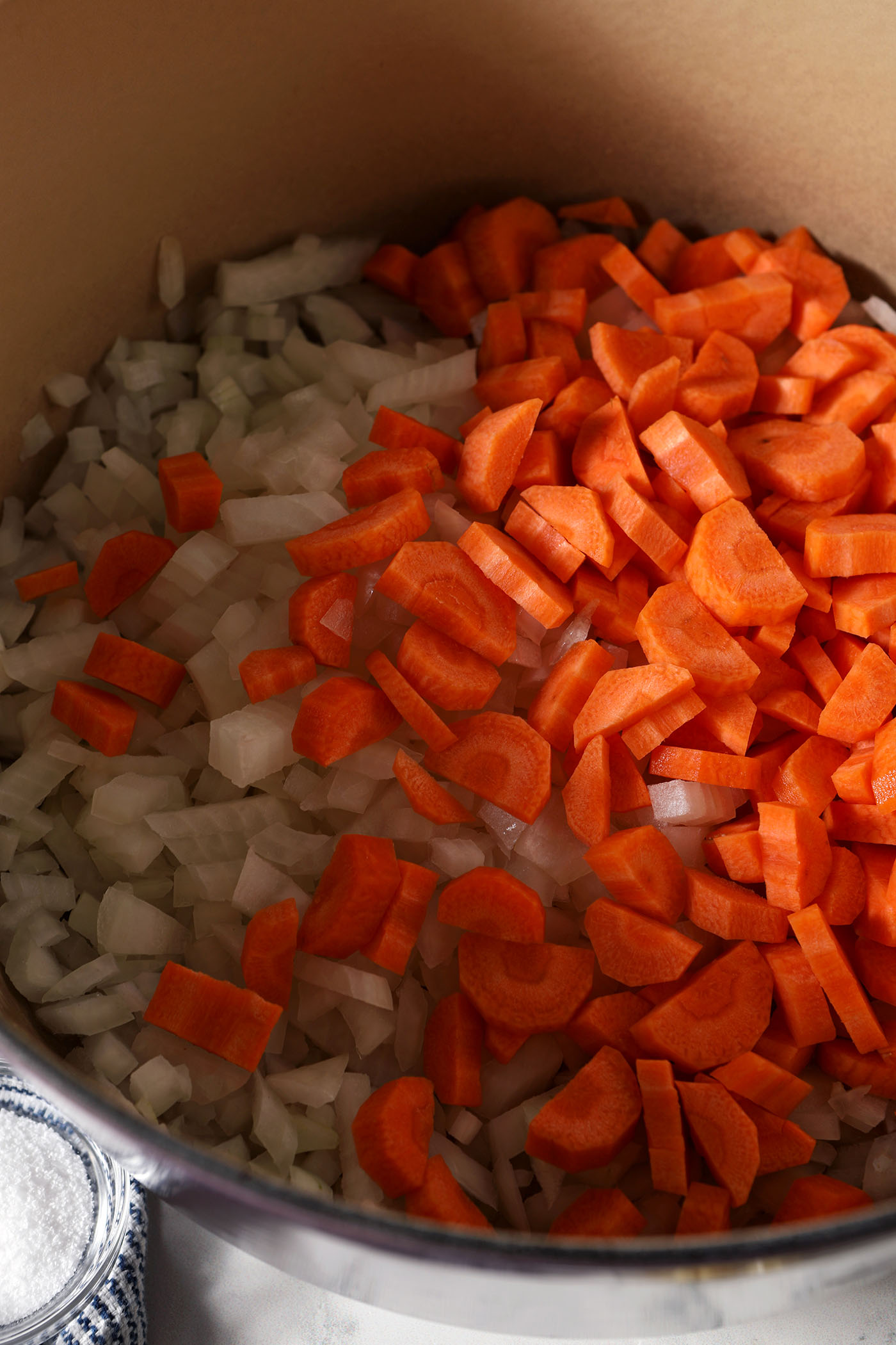 A mirepoix in a dutch oven before cooking