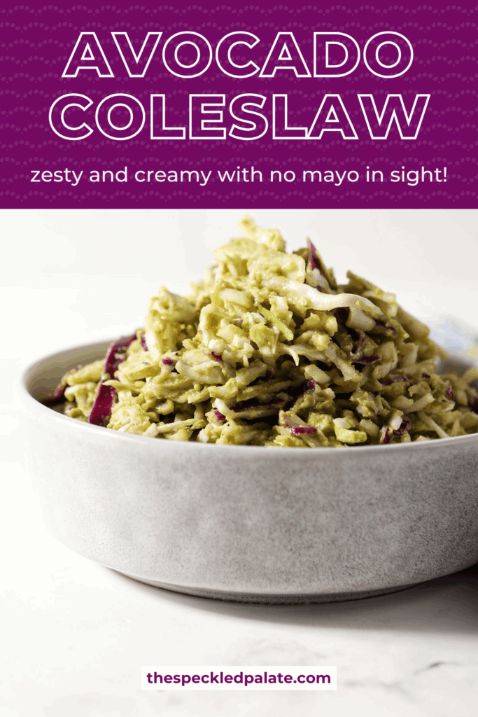 Side angle of homemade avocado coleslaw in a bowl with the text avocado coleslaw zesty and creamy with no mayo in sight