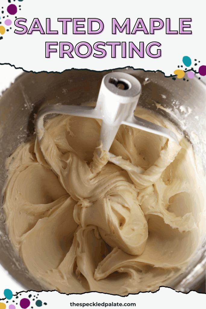 Close up of Frosting with a paddle attachment of a mixer in a metal bowl with the text salted maple frosting