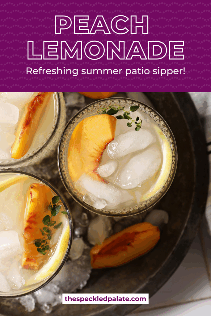Overhead of three glasses of peach lemonade in a metal bowl with ice on a white tiled surface with a blue striped linen with the text peach lemonade refreshing summer patio sipper