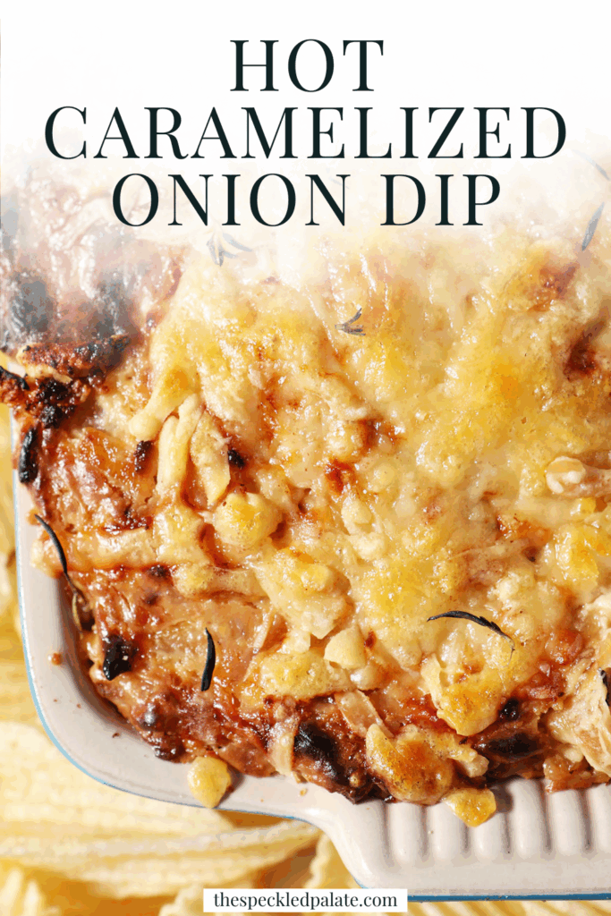 Detailed overhead of a cheesy onion dip after coming out of the oven with the text hot caramelized onion dip