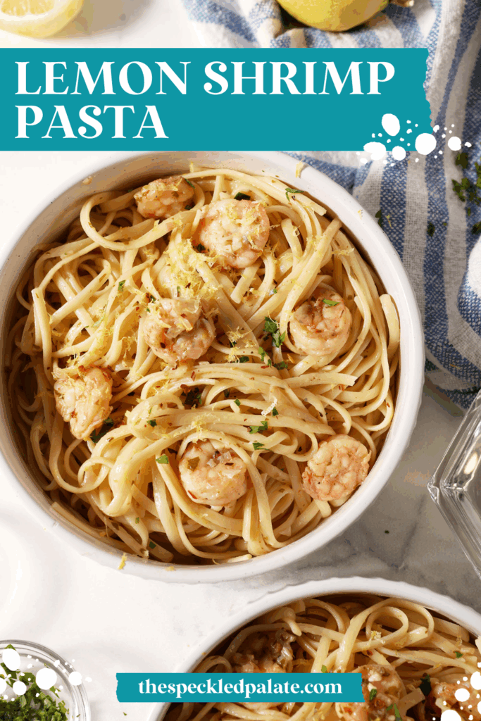 Close up of a bowl of lemon shrimp pasta garnished with extra parsley, lemon zest and red pepper flakes with the text lemon shrimp pasta with the text lemon shrimp pasta