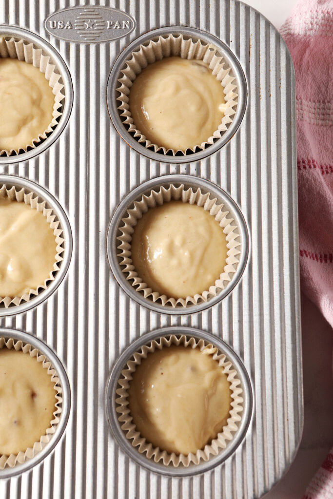 Cupcake batter in cupcake pan, before baking