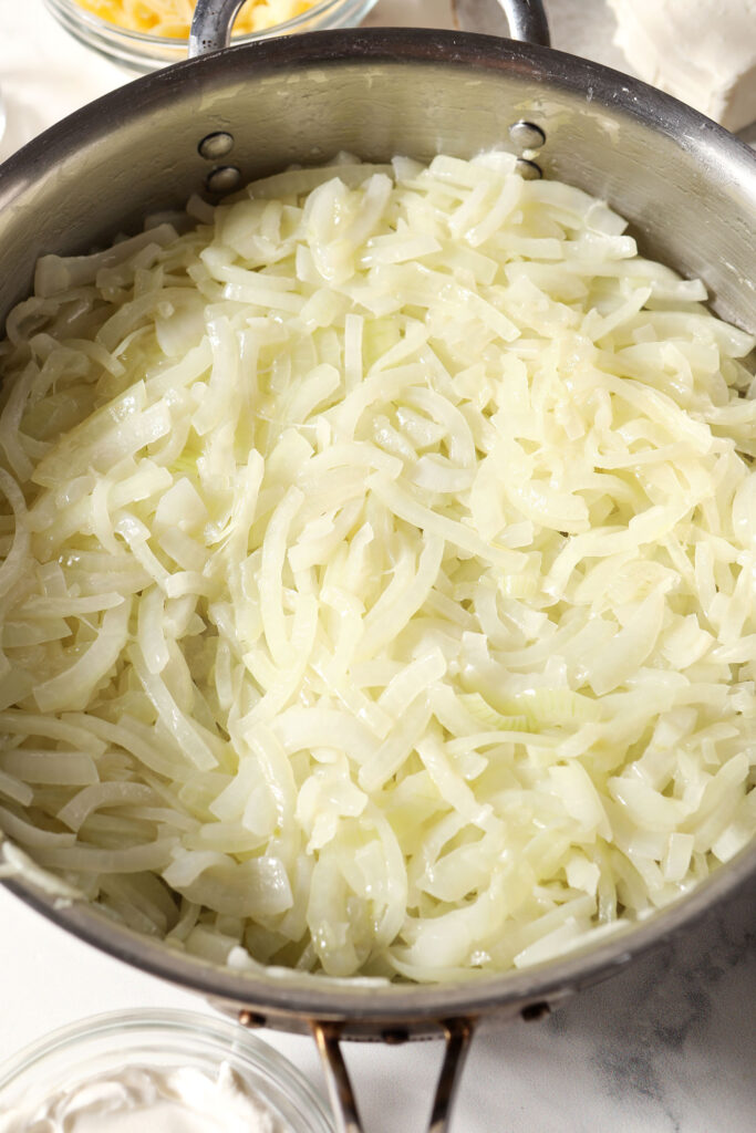 Onions in a skillet with salt before cooking