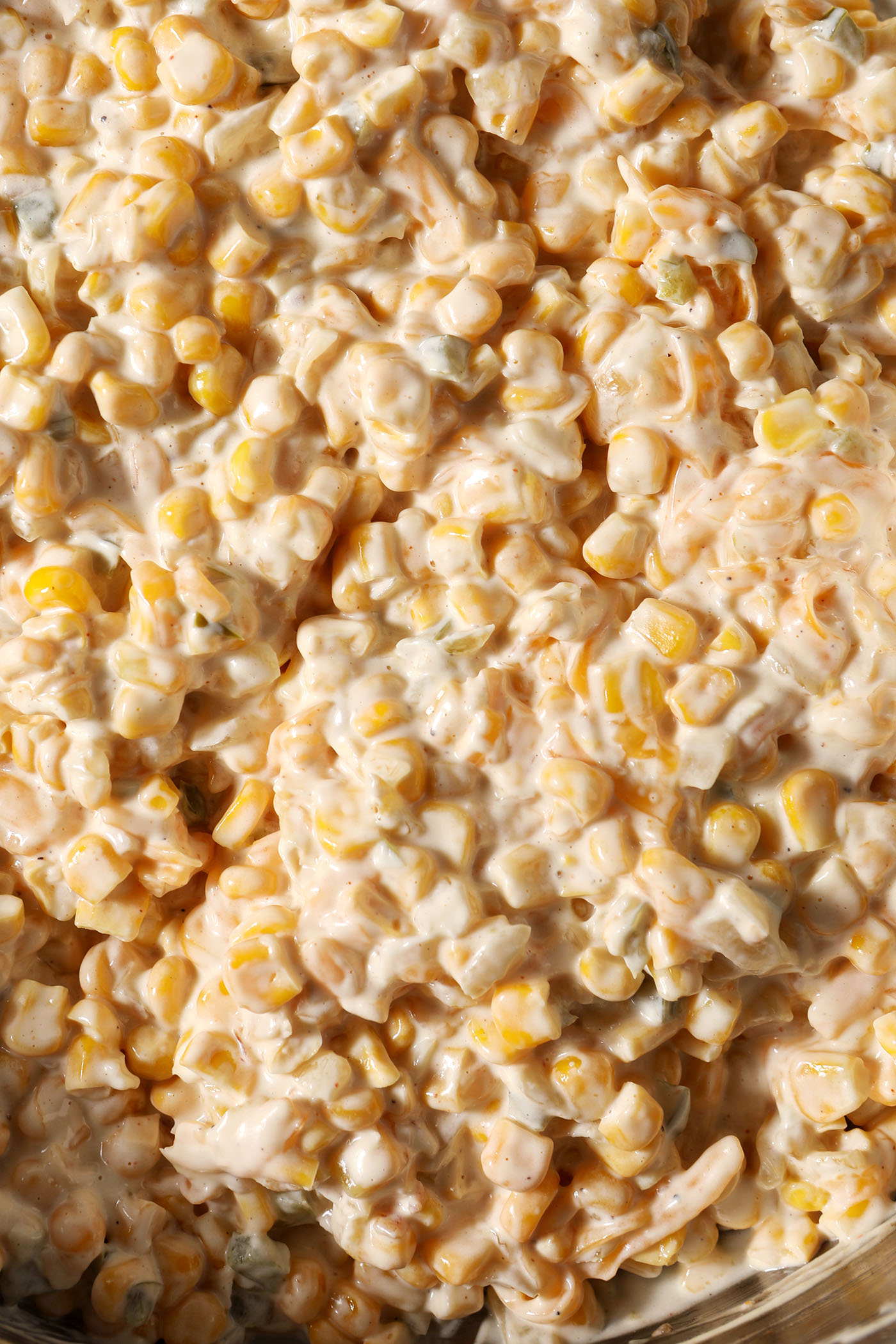 Close up of the final creamy corn dip in a skillet