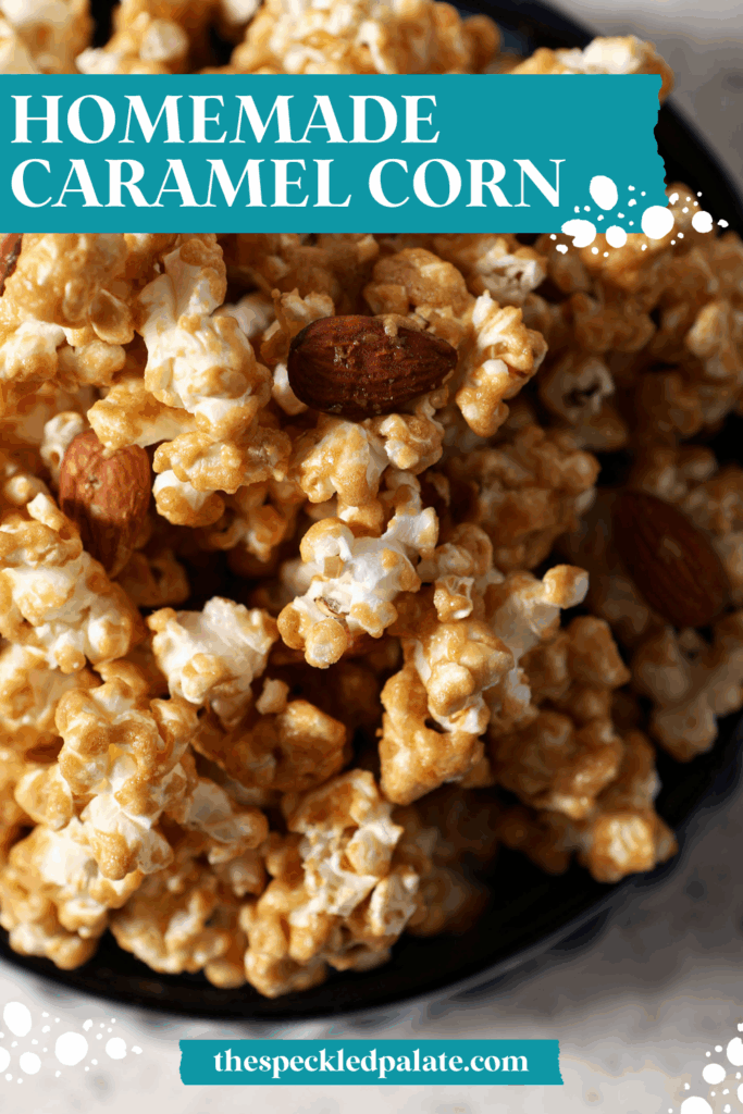 Caramel corn with almonds on a sheet pan after baking with the text homemade caramel corn