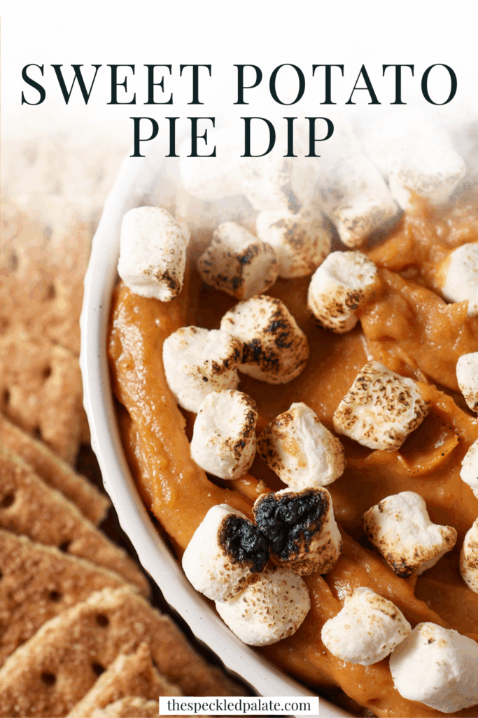 Overhead of a bowl of Sweet Potato Pie Dip topped with toasted marshmallows and surrounded by graham crackers with the text sweet potato pie dip