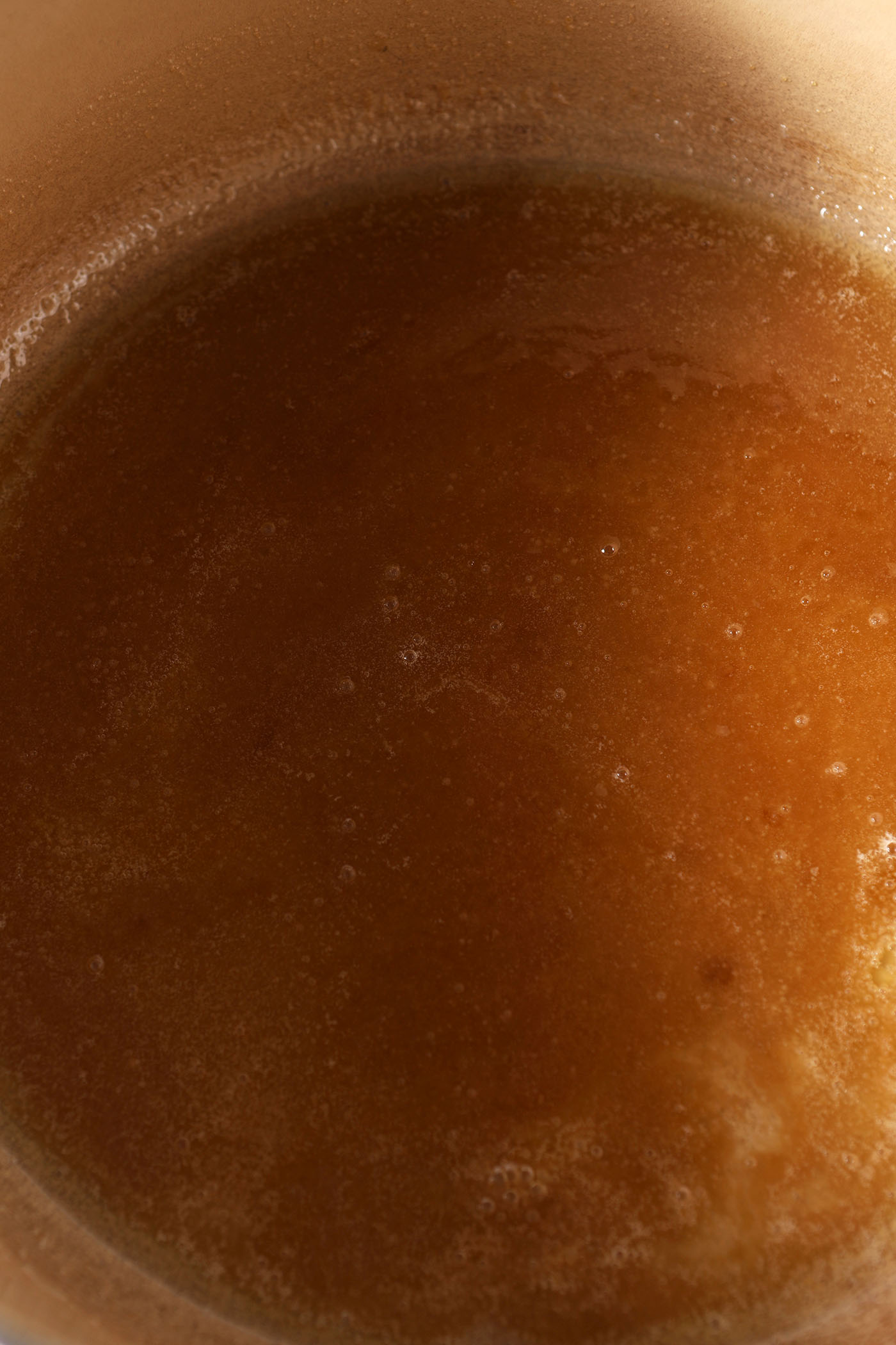 Melted butter with sugar and salt in a pot