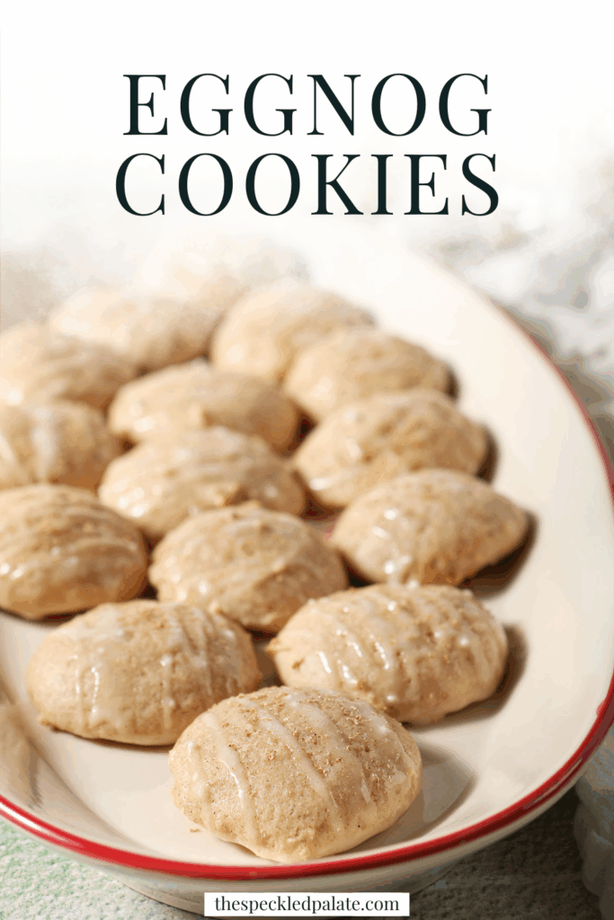 A plate of eggnog cookies in front of two bottles of eggnog with the text eggnog cookies