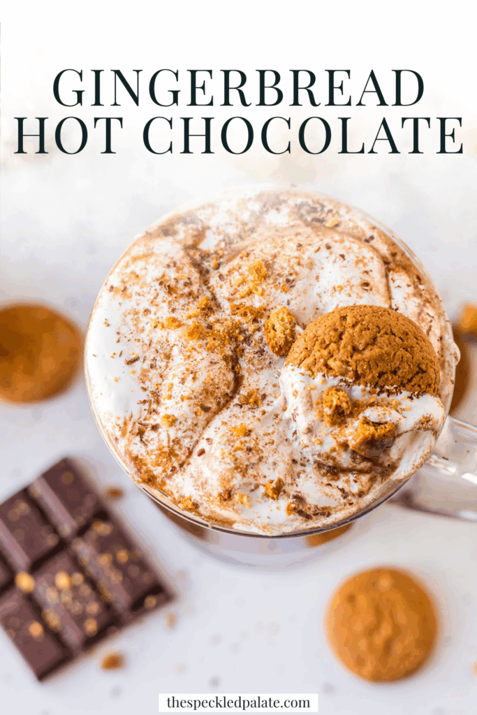 overhead of a mug of a sweet drink garnished with cookie crumbs with the text gingerbread hot chocolate