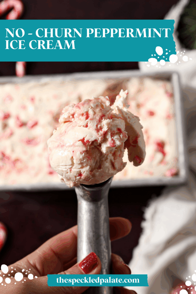 An ice cream scooper holds a scoop of no churn peppermint stick ice cream above a loaf pan on a dark red surface with the text no churn peppermint ice cream