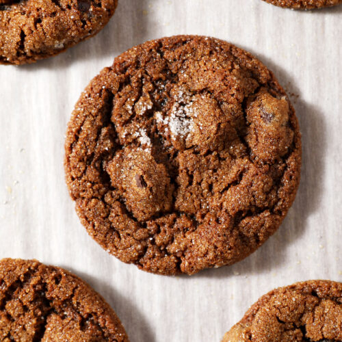 Chocolate Gingerbread Cookies on white parchment paper after baking