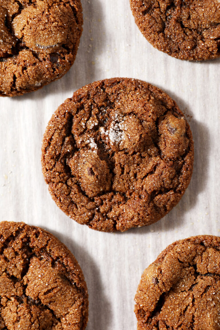 Chocolate Gingerbread Cookies on white parchment paper after baking