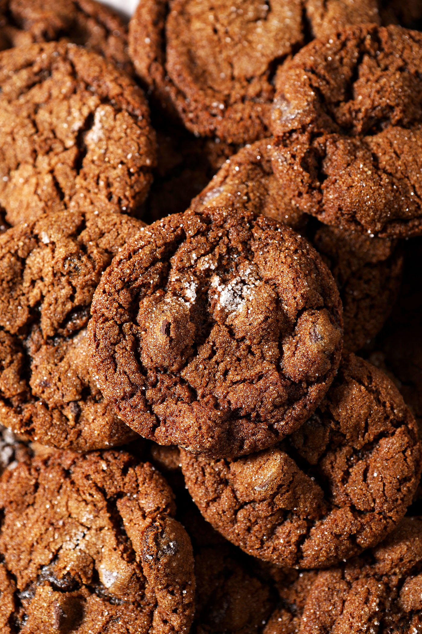Chocolate Gingerbread Cookies stacked on top of each other after baking
