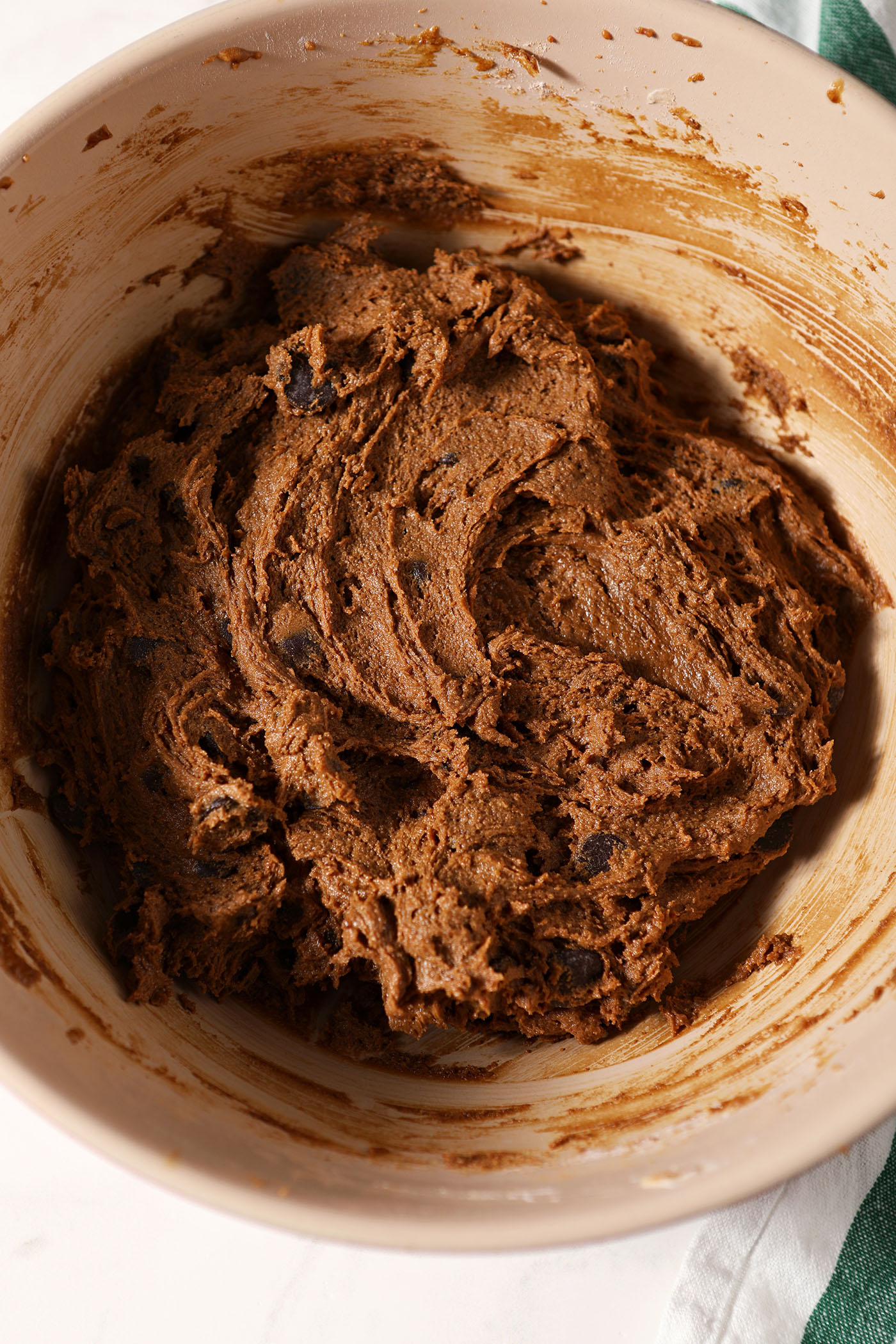 Chocolate gingerbread cookie batter in a bowl