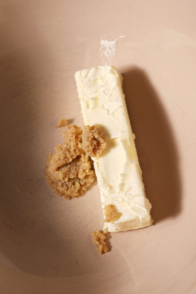 Butter and ginger in a bowl before mixing