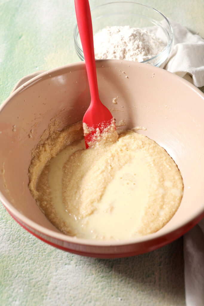 Eggnog sits on top of wet ingredients before stirring