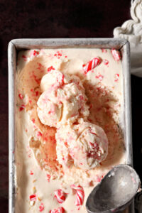 Two scoops of no churn peppermint ice cream in a loaf pan