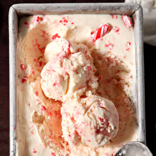 Two scoops of no churn peppermint ice cream in a loaf pan
