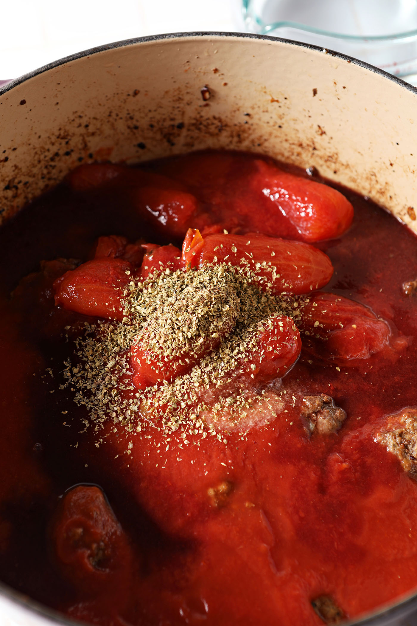 Sauce ingredients in a dutch oven before cooking