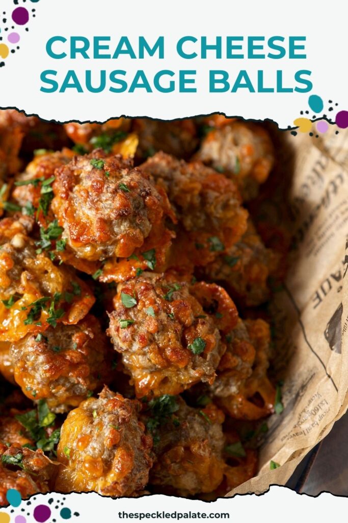 Close up of a sausage balls recipe garnished with chopped parsley with the text cream cheese sausage balls