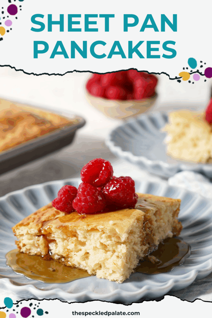 A square pancake on a blue plate topped with fresh raspberries and syrup with the text sheet pan pancakes