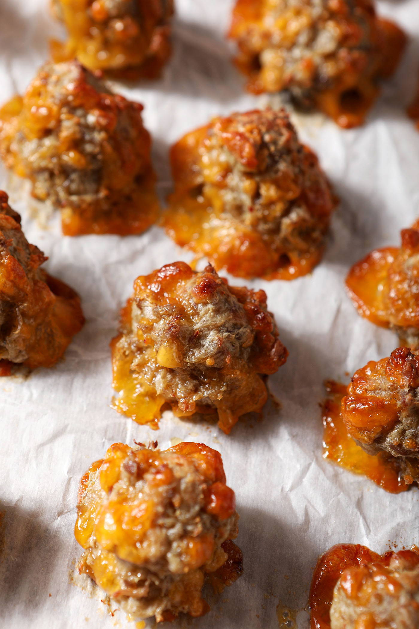 Sausage balls on a sheet pan after baking