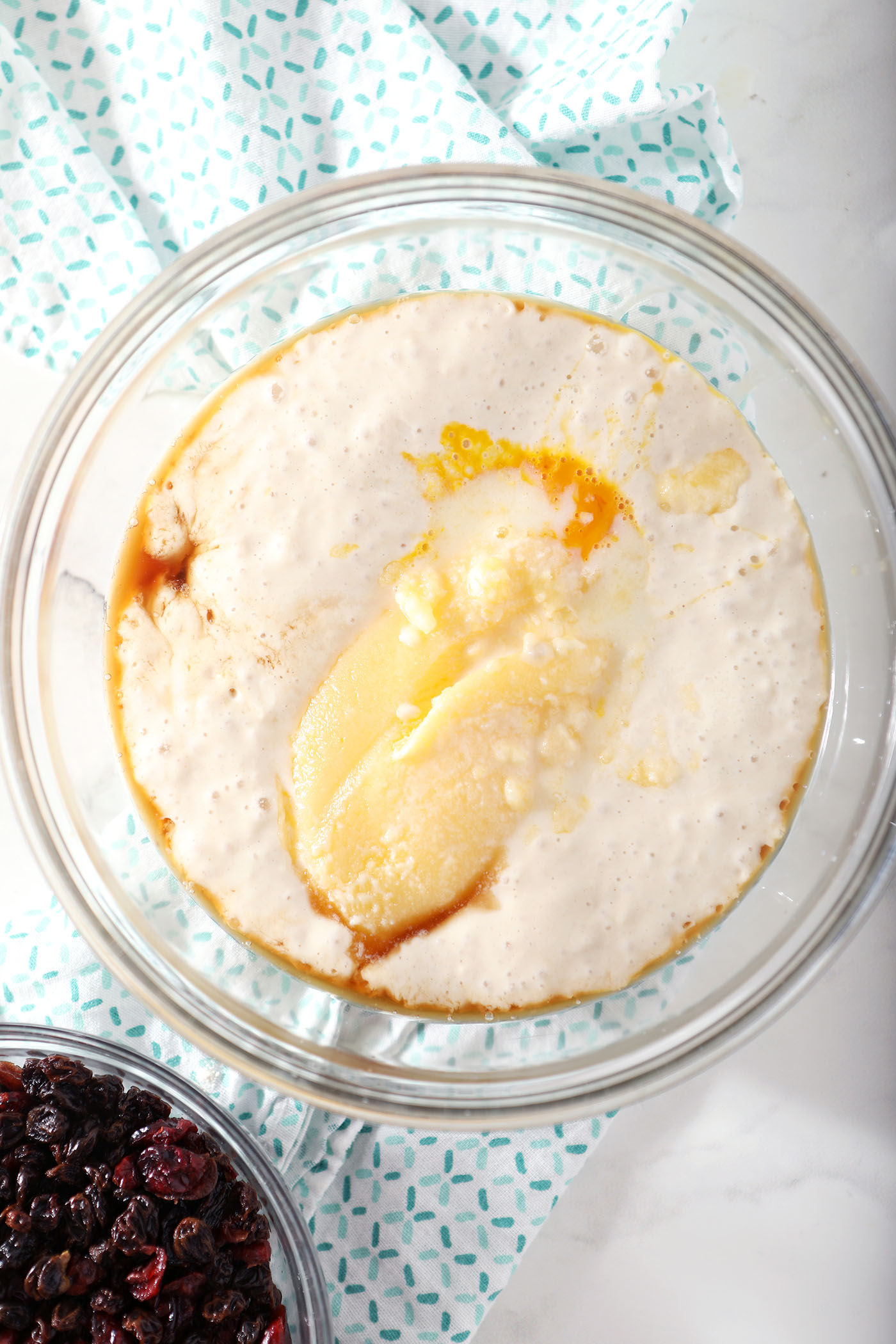 Liquid ingredients in a bowl before mixing for easter bread