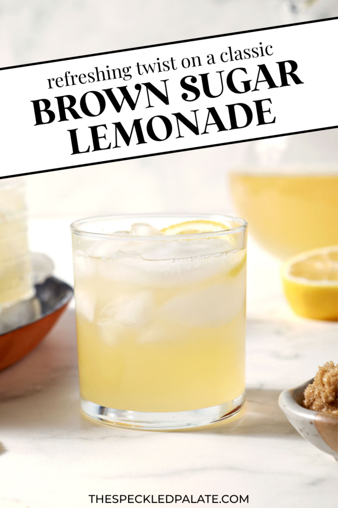 One glass of brown sugar lemonade on a marble surface with more lemon slices, and a bowl of brown sugar with the text "Brown Sugar Lemonade" on top.
