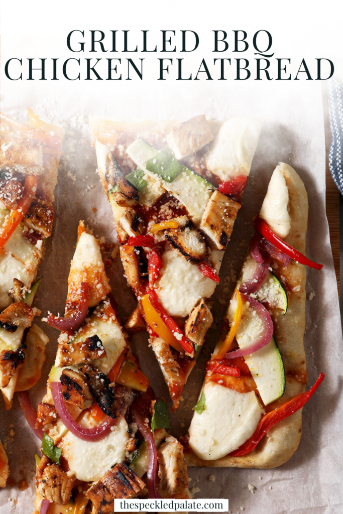 grilled bbq chicken and summer veggie flatbread cut into triangles on a wooden serving platter with the text "Grilled BBQ Chicken Flatbread"