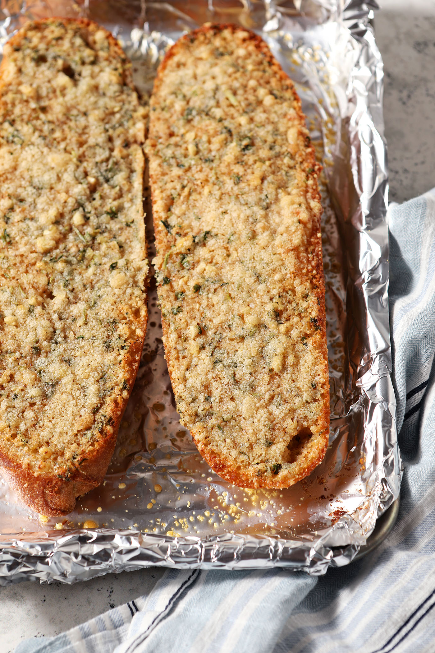 Cajun Garlic Bread after baking on a sheet pan lined with foil