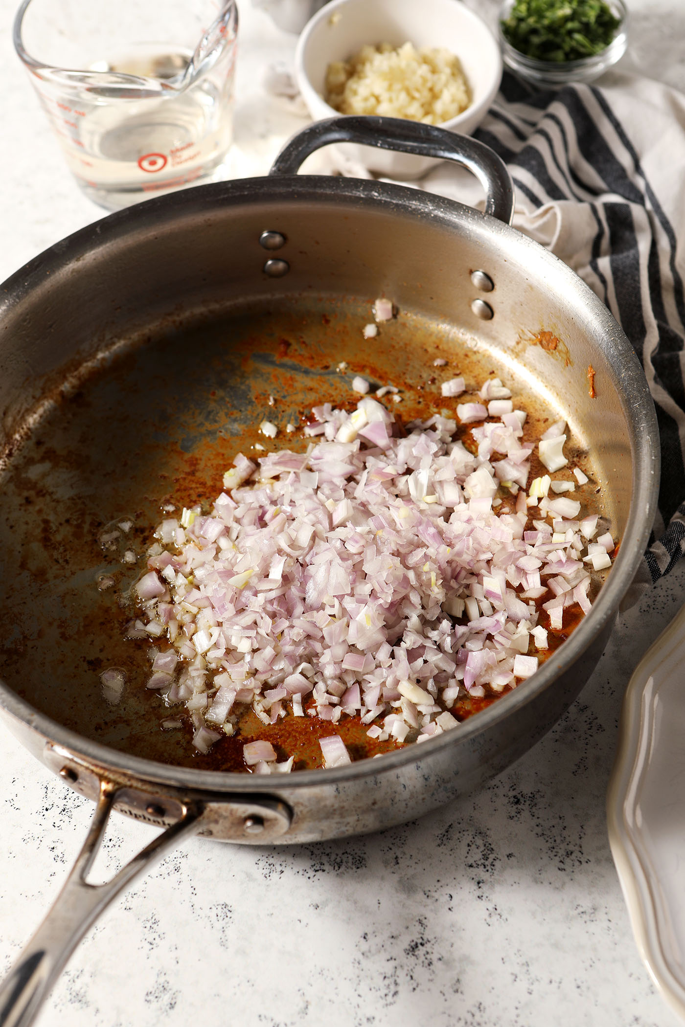 Minced shallots in a skillet