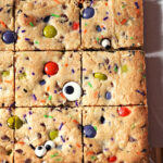 Sliced Halloween Cookie Bars on parchment paper