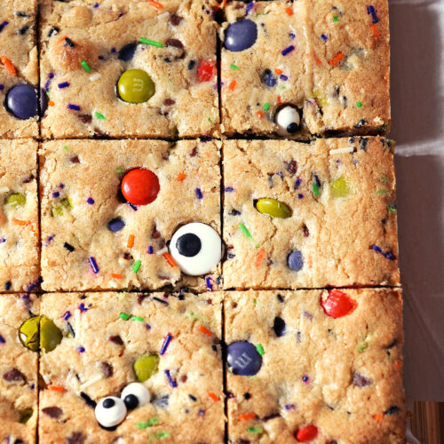 Sliced Halloween Cookie Bars on parchment paper